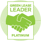 Green Lease Leader Platinum award with two green hands shaking, representing sustainable partnership.